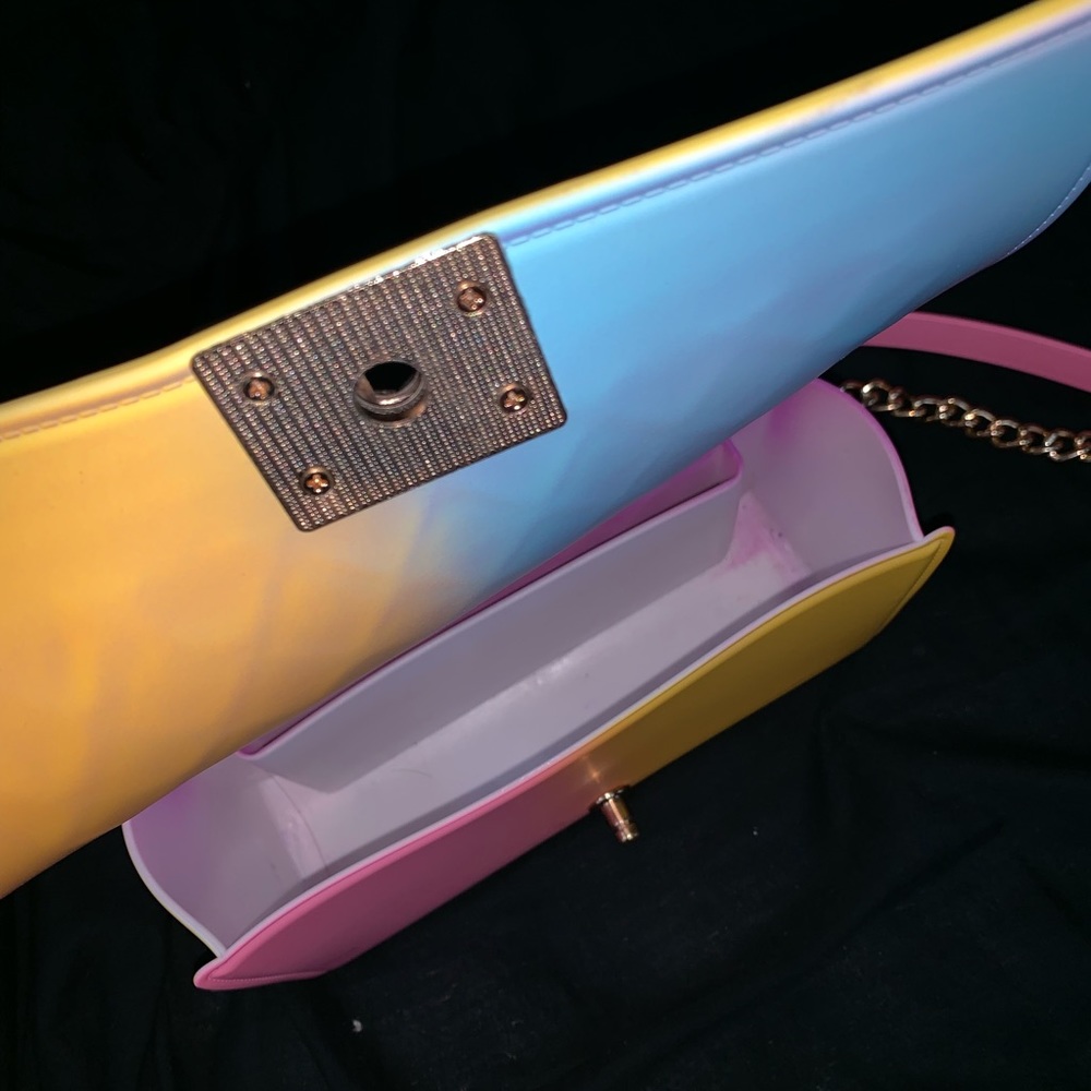 multicolored hand bag